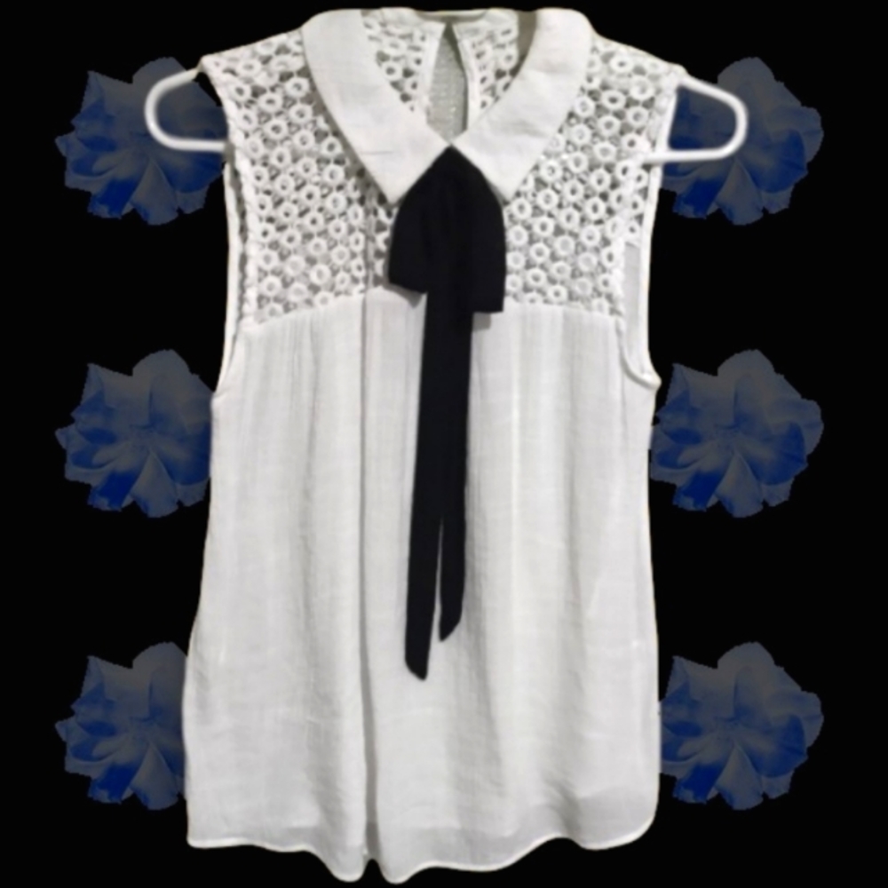 Lydelle modest flowy sleeveless white top size medium